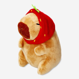 Plush toy capybara with strawberry hat