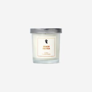 Scented candle with peach fragrance - Image 1